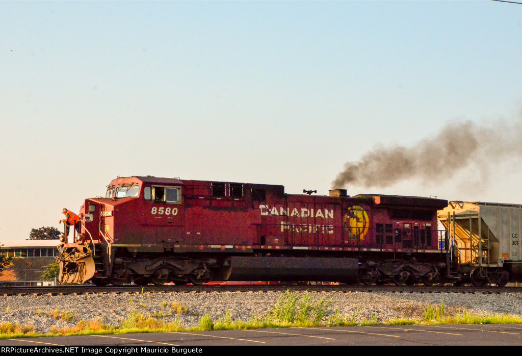 CP AC44CW Locomotive leading a train